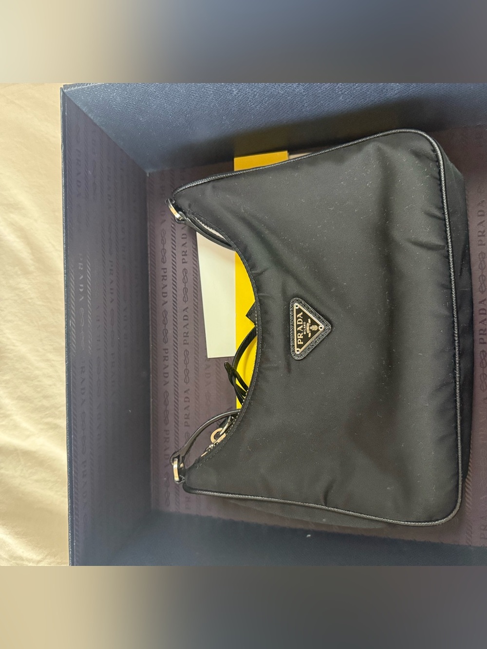 Prada Re-Edition 2005 Re-Nylon and Saffiano mini bag black with leather strap